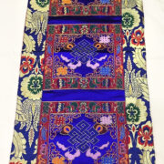 Cloth with endless knot decor
