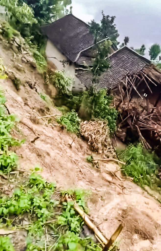 a landslide destroying a house in Kavre Nepal