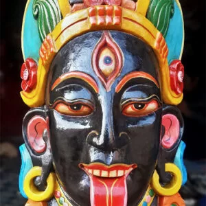 handcrafted wooden mask of Hindu Goddess Kali